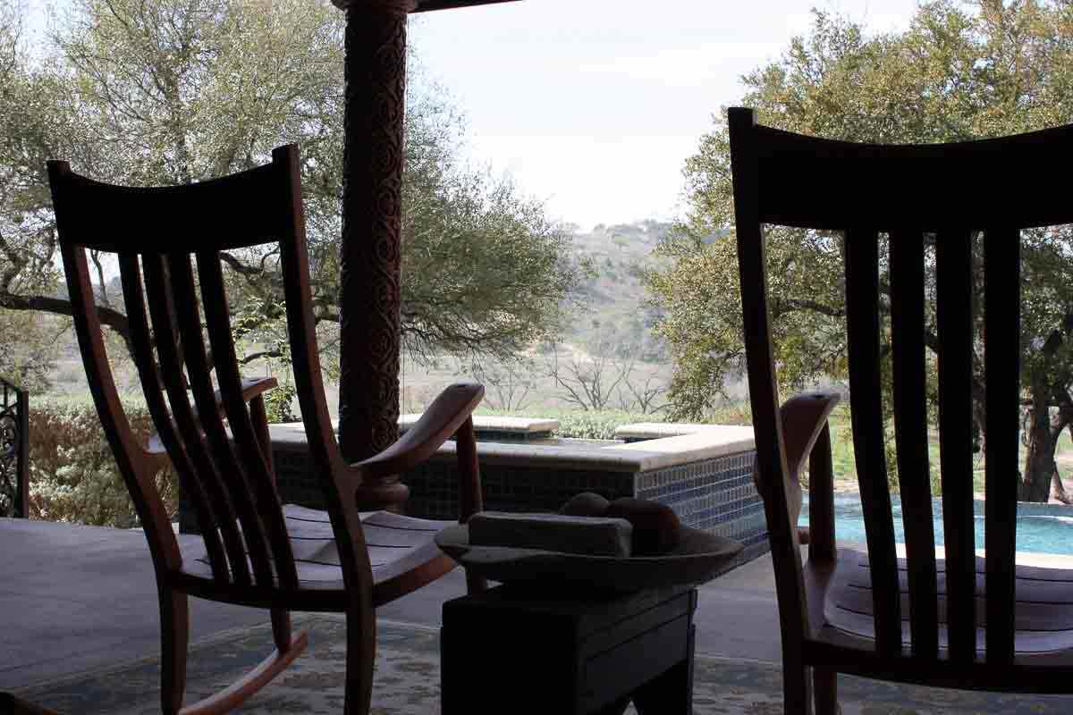 Two porch rockers overlooking the Blanco River Valley