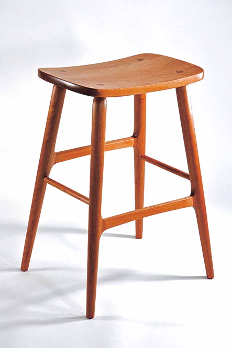 Berry barstool in cherry, studio view